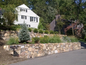 Stacked Stone Wall and Gardens create an inviting landscape at this Mountainside NJ property