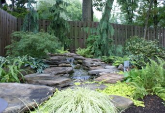 A custom landscape design with a Water Feature in Westfield NJ
