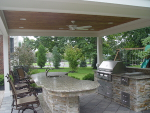 An outdoor kitchen complete the landscape construction done at this home in Basking Ridge NJ