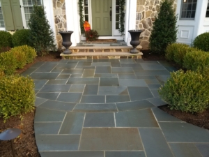 Bluestone Entry with plantings to line the way complete this front landscape design